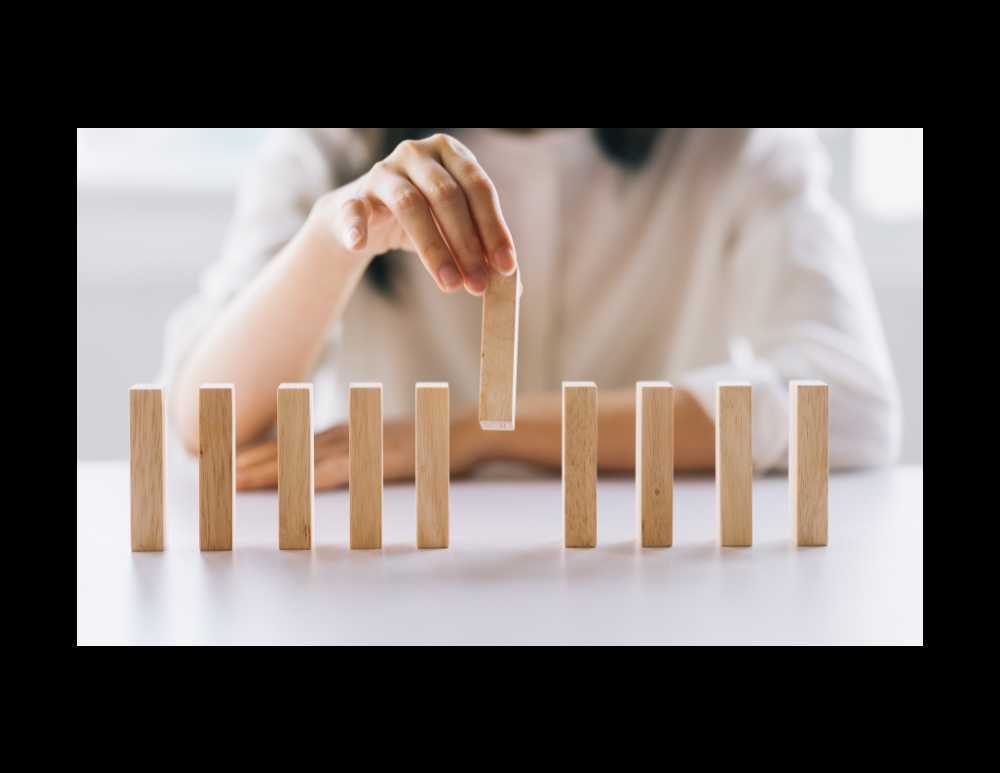 An image of a person placing a last piece of a puzzle