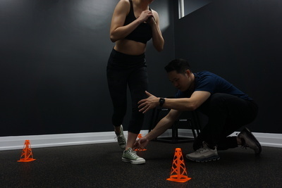 Chiropractor conducting assessment on patient